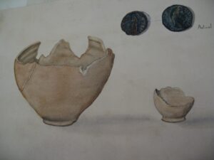 Roman cremation urn and coin of Antonius Pius